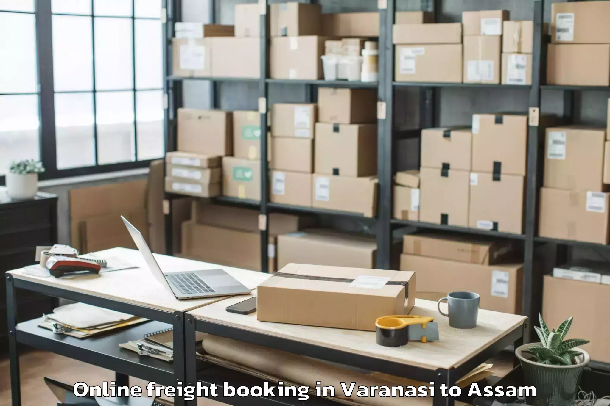 Top Varanasi to Bokajan Online Freight Booking Available